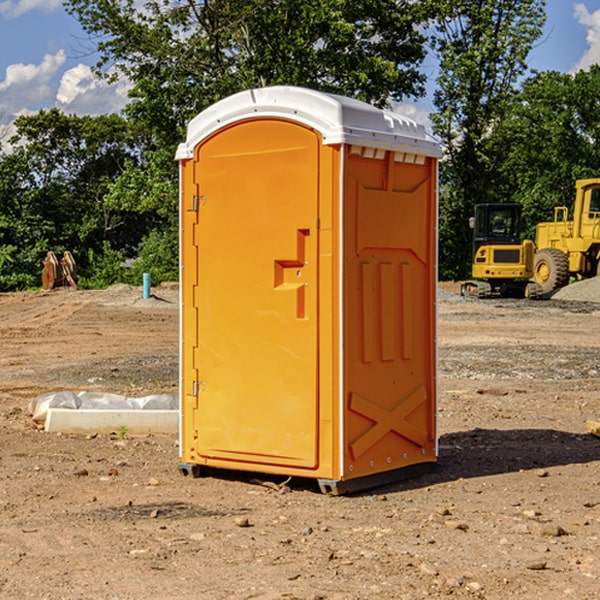 how often are the portable restrooms cleaned and serviced during a rental period in Everson